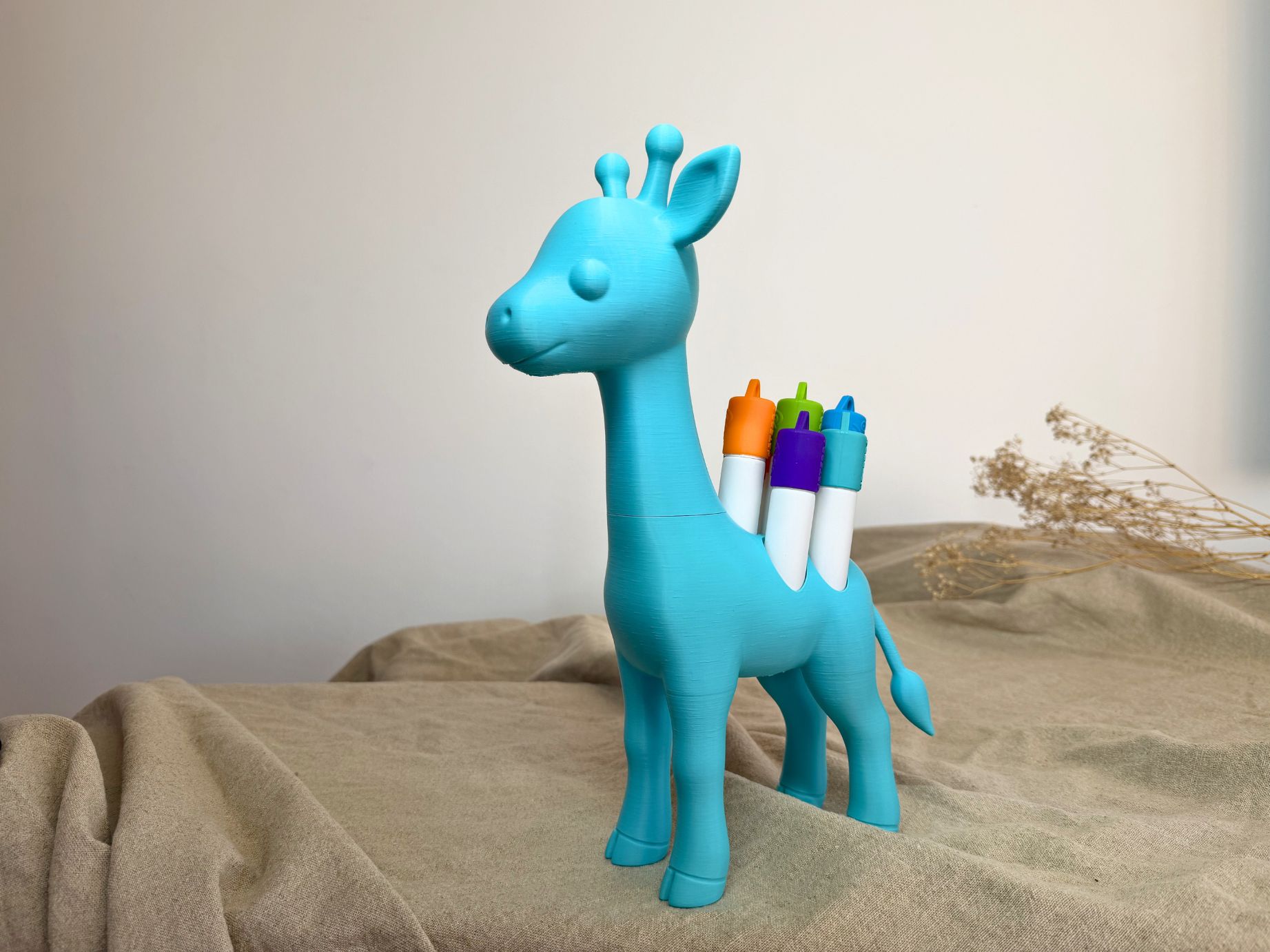 Roll-On Halter „Giraffe“ Türkis mit 7 Steckplätzen für Kids-Öle. Süße Aufbewahrung für ätherische Öle im Kinderzimmer – praktisch, liebevoll & einzigartig.